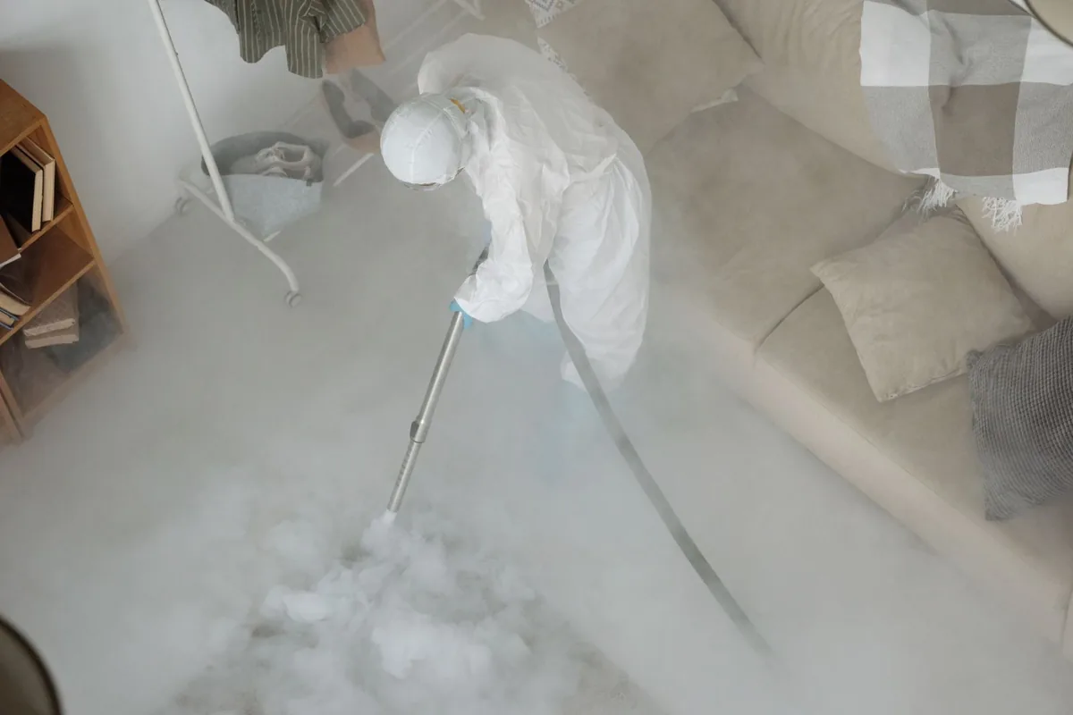 Biohazard cleanup technician in protective equipment, Royal Terrace, Jacksonville, FL